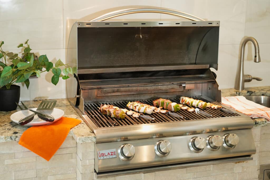 Magnolia House Sarasota Blaze Grill with Food Cooking