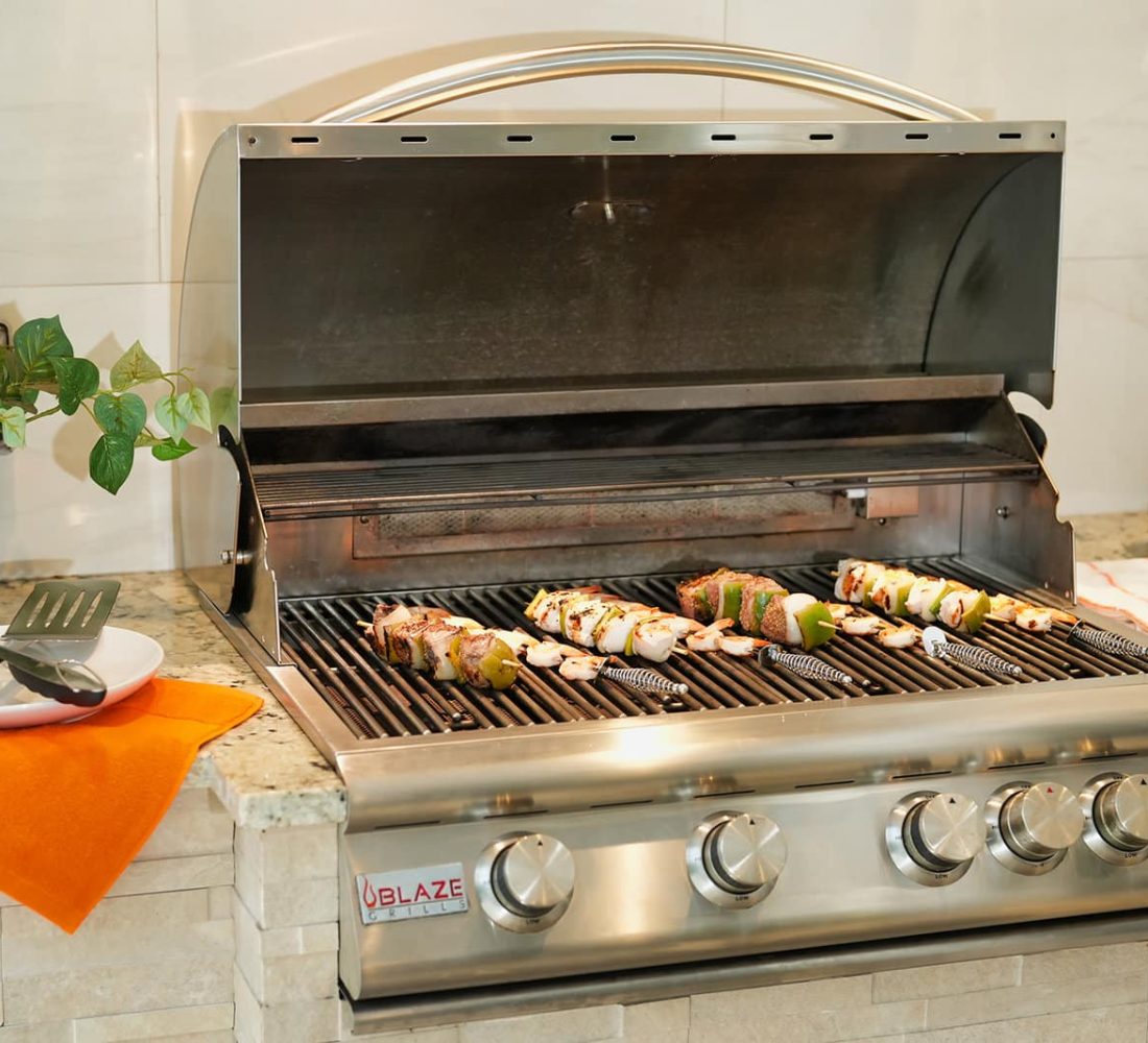 Magnolia House Sarasota Blaze Grill with Food Cooking